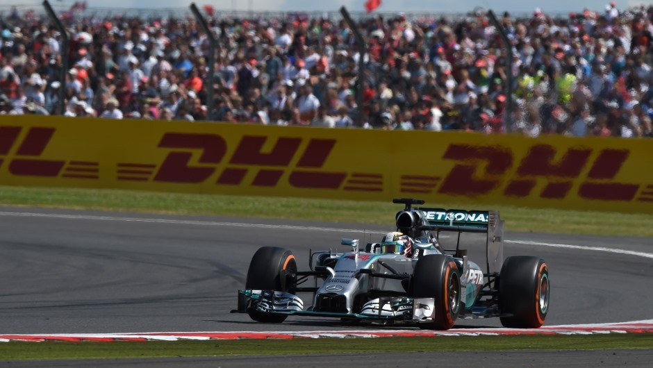 Hamilton races to checkered flag & fastest lap on home turf