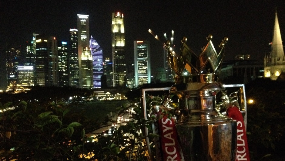 Trophy taking in the Singapore skyline