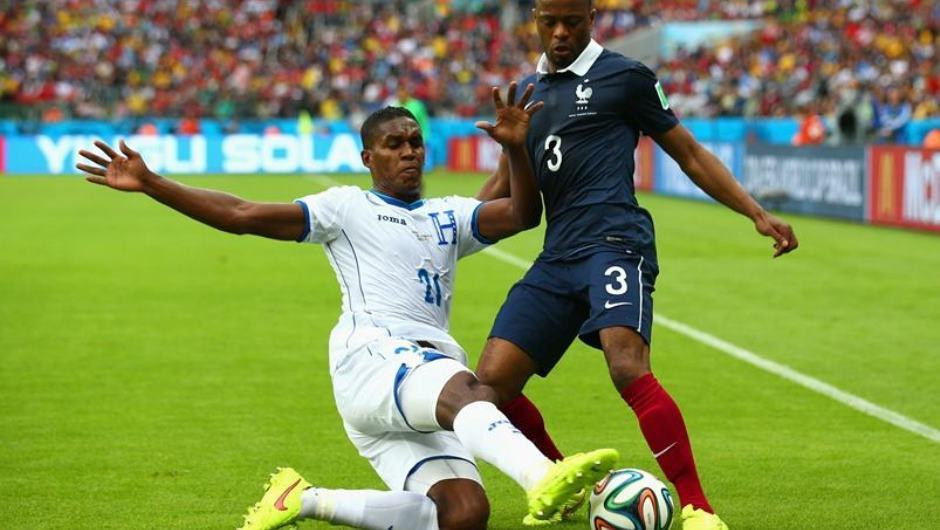 Evra defends against Honduras in group stage
