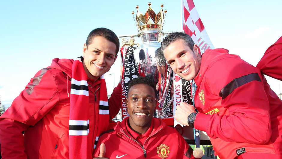 Javier Hernandez, Robin Van Persie and Danny Welbeck celebrate with the Premier League Trophy
