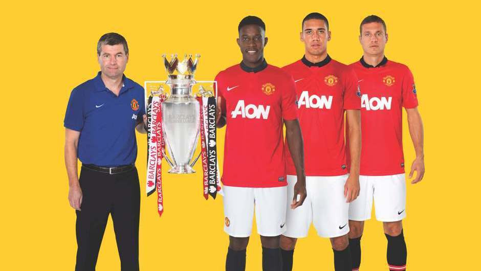 Manchester United Legend Denis Irwin pose with current players Danny Welbeck, 