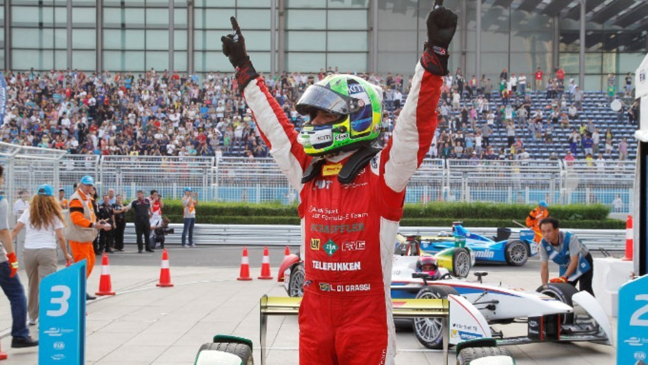 Lucas di Grassi celebrates winning the first ever Formula E race in Beijing.