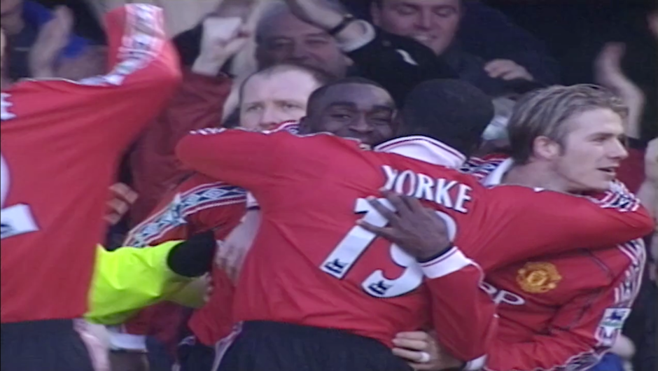Dwight Yorke hugs Andy Cole after a goal