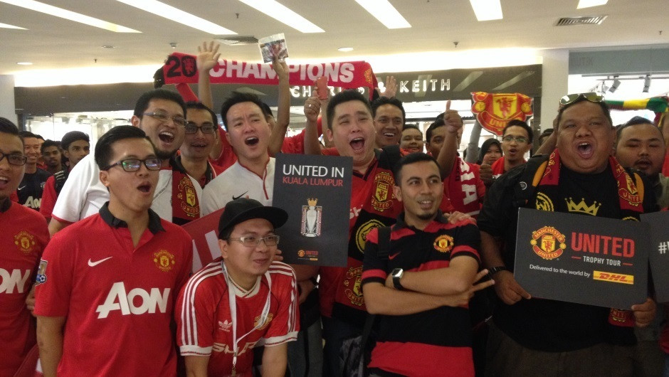 While waiting fans break out in song: Glory Glory Man Utd